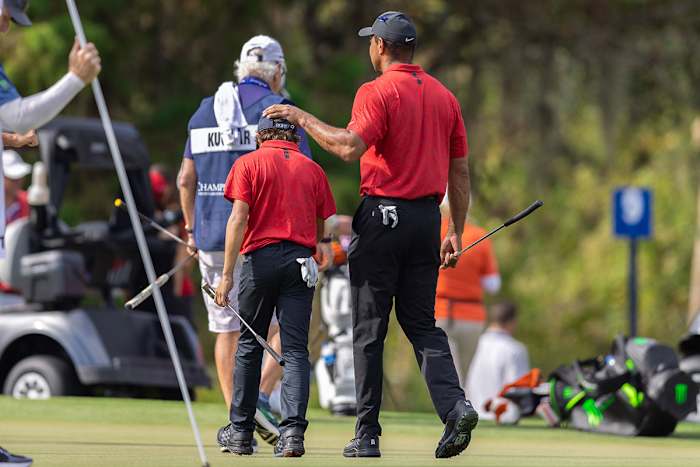 Tiger Woods and Charlie on Sunday at the PNC Championship.